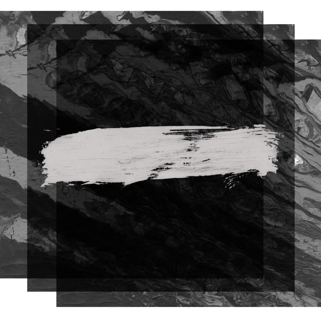 a black and white painting with a brush on it